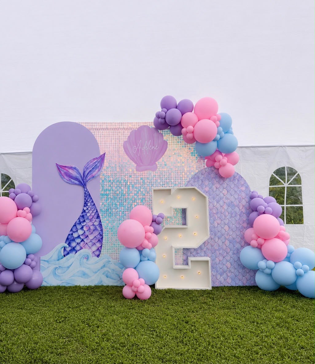 Pastel mermaid themed marquee birthday backdrop by LUX Event Design